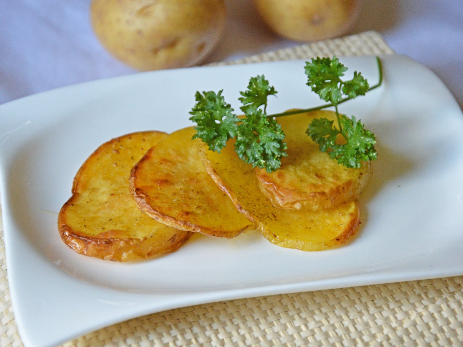 Pikante Kartoffelscheiben aus dem Ofen - GuteKueche.ch